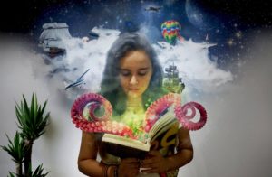 girl reading book with magic coming out
