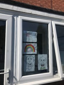 rainbow picture in a window